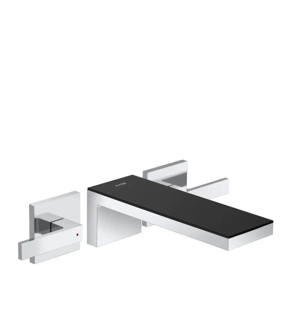 Waschtischarmatur mit schwarzem Glas-Aufsatz und verchromten Edelstahl-Elementen, montiert als 3-Loch-Design. Hersteller: AXOR.